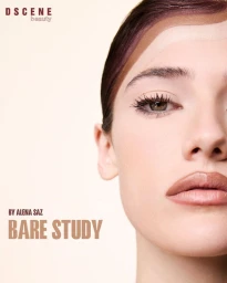 Close-up beauty portrait of a woman with curved makeup swatches across her forehead against a pale background