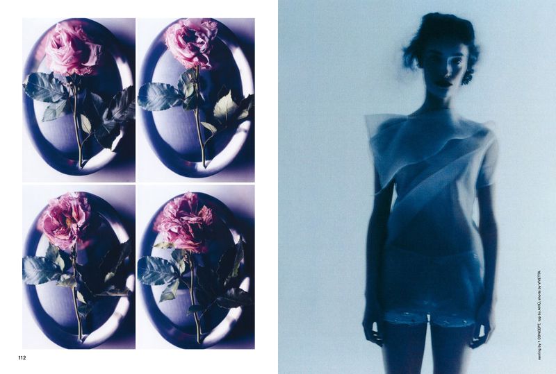 Artistic fashion editorial with an adult woman in sheer clothing and a still life featuring roses in silver bowls with a blue tint.