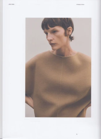 Model Sara Blomqvist wearing a structured camel knit top against a neutral backdrop for Lisa Yang.