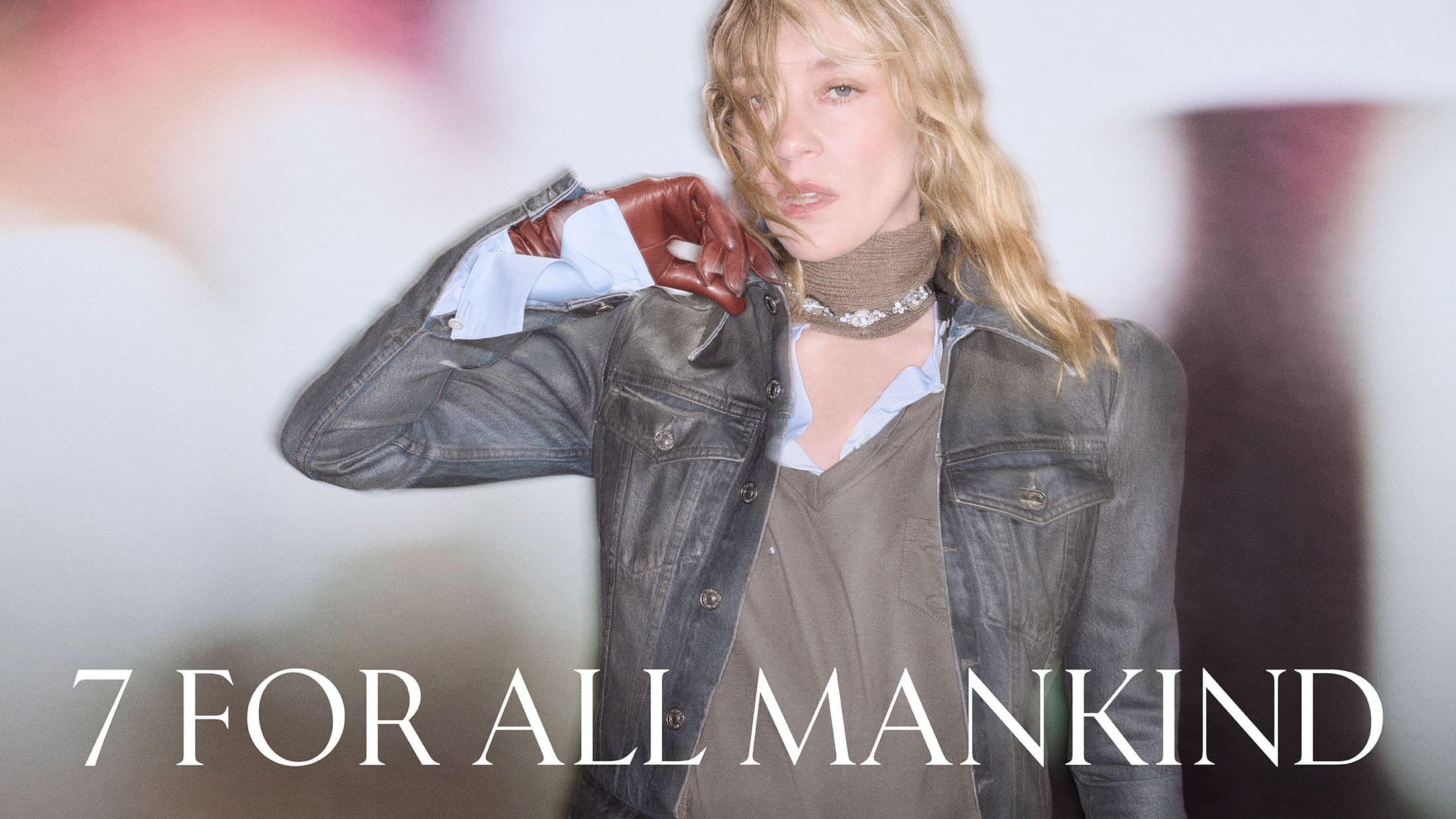 Chloë Sevigny in a dark washed denim jacket with brown leather gloves for 7 For All Mankind campaign.