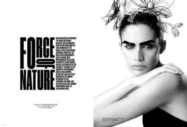 Black and white portrait of model Sara Sampaio wearing an intricate botanical headpiece and dark structured eyebrows for V Magazine.