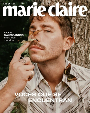 Magazine cover featuring Vicco D'Alessandro, butterflies on face, striped shirt, against a tree, promoting Argentina's Marie Claire.