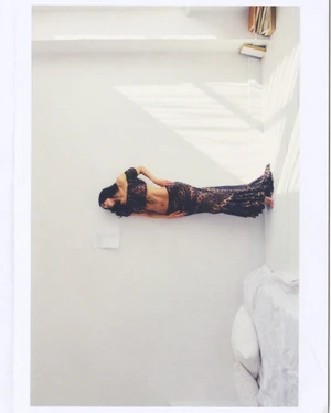 Kylie Jenner wearing leopard print two piece set against white studio wall for Khy Dear Summer collection