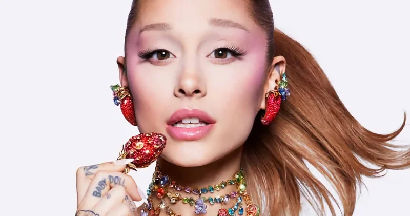 Ariana Grande wearing crystal strawberry earrings and colorful gemstone necklaces for Swarovski Summertime