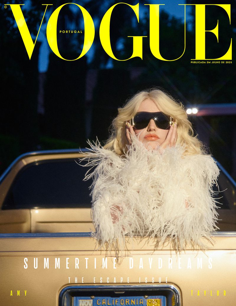 Vogue Portugal magazine cover featuring a blonde model in sunglasses and a feathered jacket in the back of a golden car at night.