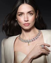 Ana de Armas wearing a diamond and gemstone necklace and ring for Louis Vuitton Mythica project
