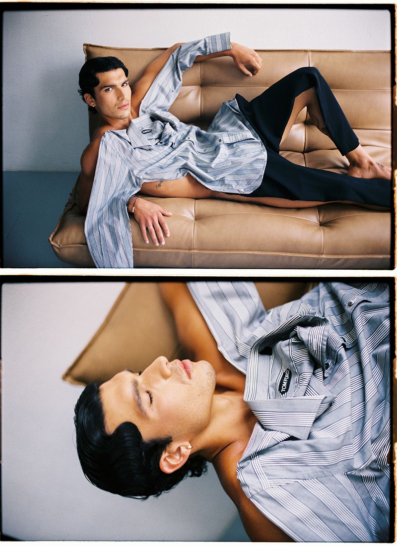 Man poses on tan leather couch wearing a striped shirt and black pants against a neutral wall backdrop, in a split-frame editorial shot.