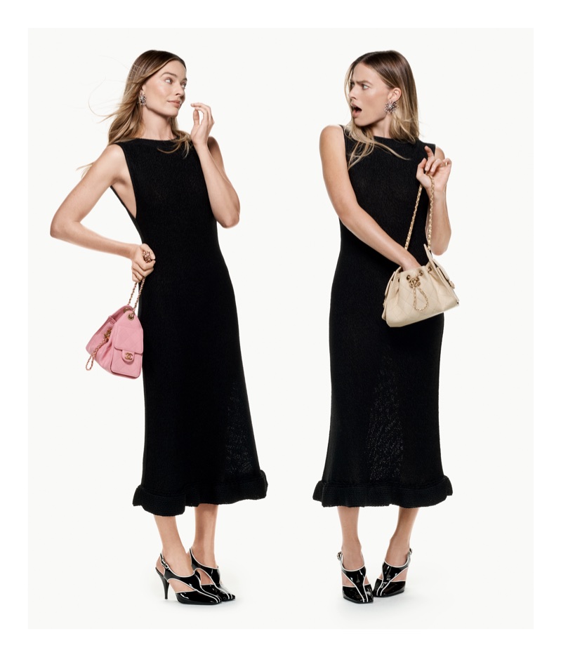 Margot Robbie depicted twice side by side in matching black sleeveless midi dresses holding pink and cream Chanel handbags on a white backdrop.