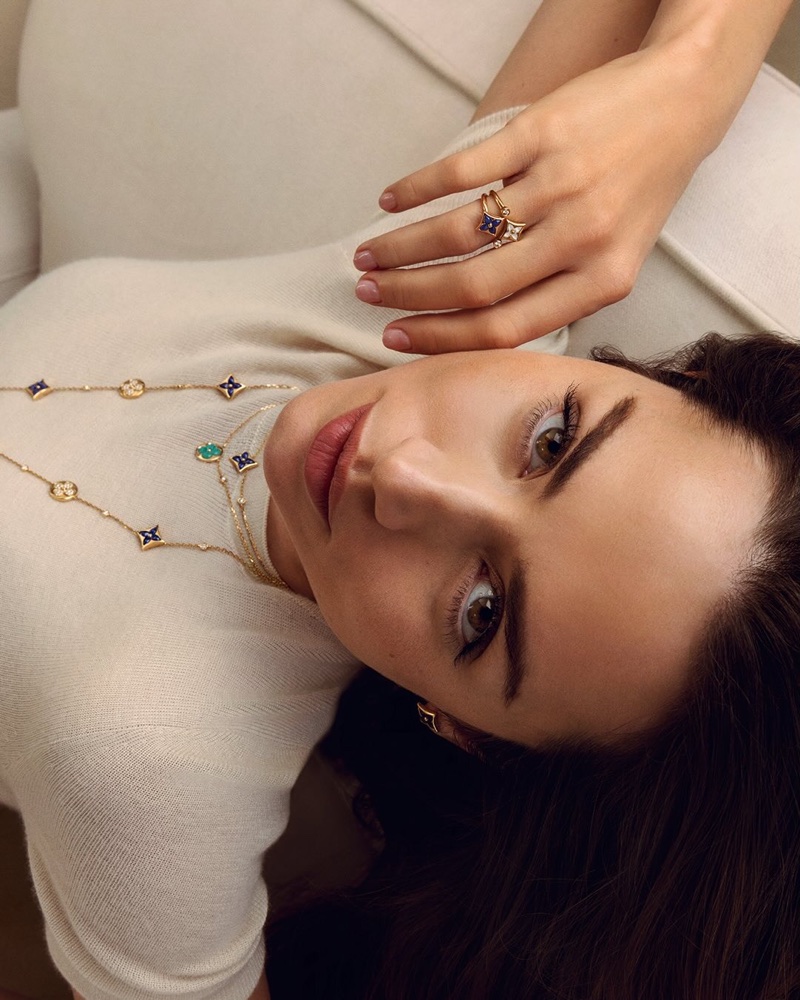 Ana de Armas wearing Louis Vuitton fine jewellery including diamond and coloured stone rings and a delicate pendant necklace.