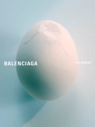 A single cracked white egg centered against a pale gradient blue and white background with Balenciaga branding.