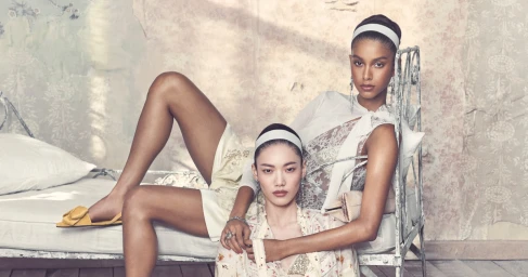 Two female models posing on a vintage iron bed for the Zara Spring-Summer 2026 campaign photographed by Steven Meisel.