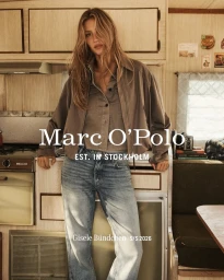 Gisele Bundchen wearing a brown jacket and blue jeans inside a campervan for Marc O'Polo Spring 2026 campaign.