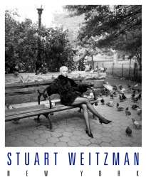 Emma Chamberlain seated on a park bench surrounded by pigeons in a black and white fashion campaign image for Stuart Weitzman.