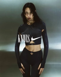Model in black athletic crop top and matching leggings against a metallic silver studio background with overlaid KNWLS and Nike logos