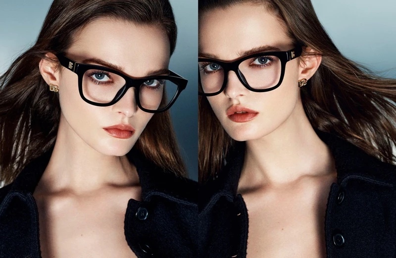 Model Lulu Tenney wearing black optical frames and earrings for Dolce & Gabbana Fall 2025 Eyewear Campaign shot by Gordon Von Steiner.