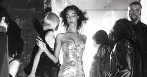 Mona Tougaard wearing a metallic strapless dress in a monochrome fashion campaign shot by Steven Meisel for Dolce & Gabbana.