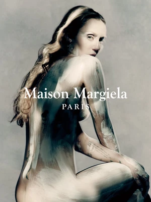 Miley Cyrus posed in profile with painted body against a textured grey background for Maison Margiela Fall-Winter 2025 Campaign