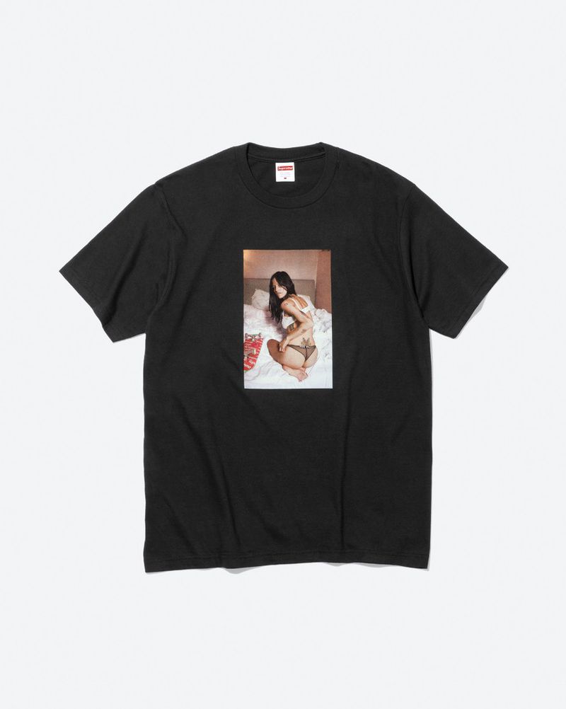 Black Supreme crewneck t-shirt featuring a rectangular photo graphic print of Gabbriette on a bed against a light background.