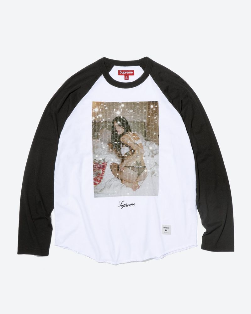 Supreme black and white long-sleeve raglan shirt with a photographic graphic print on a plain white studio backdrop.