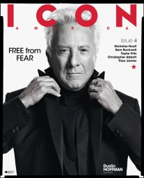 Actor Dustin Hoffman wearing a black tailored jacket and turtleneck for the cover of ICON America on a white studio background.