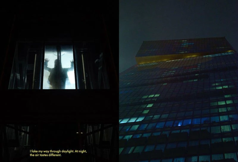 High-rise building at night with many lit windows next to a silhouetted human figure pressing against glass in a dark room.