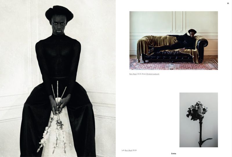 Monochrome fashion portrait of an African-American adult in black attire, seated indoors with white flowers, and a vintage-style couch scene.