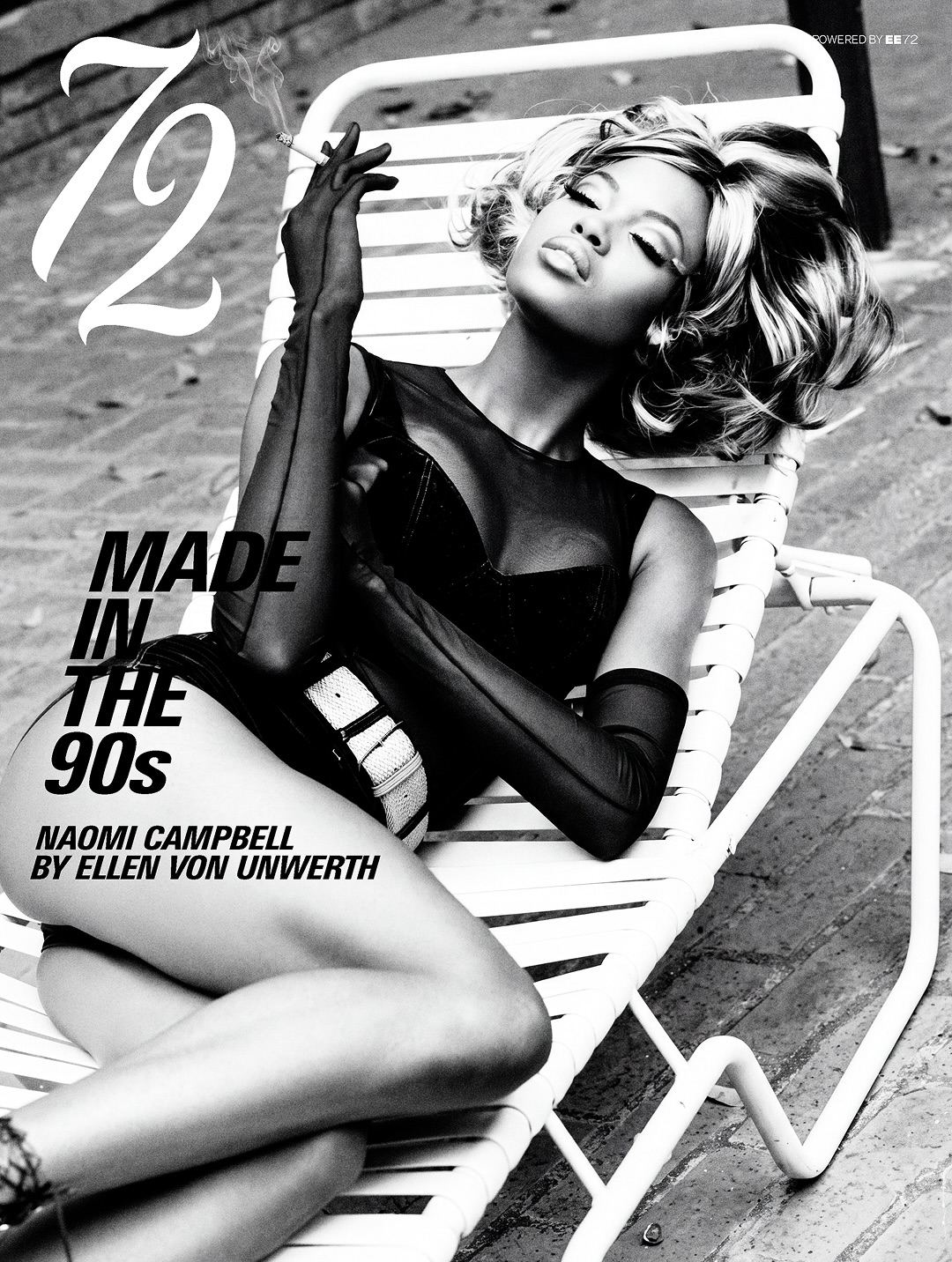 Black and white magazine cover of a woman in sheer black opera gloves reclining on a white sun lounger while holding a cigarette.