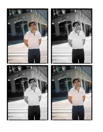 Four-panel contact sheet of a man in a white henley shirt and dark denim jeans standing on a sunny city street.