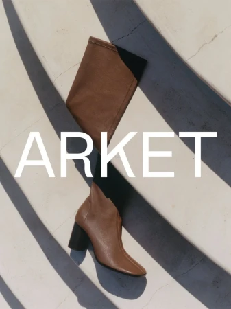 Brown leather high-heeled boot placed on a diagonally striped concrete surface with white Arket branding overlay.
