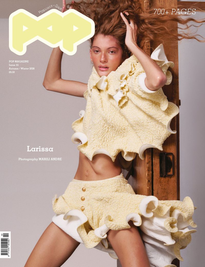 Model Larissa Moraes wearing a sculptural butter yellow ruffled top and matching skirt on the cover of Pop Magazine.