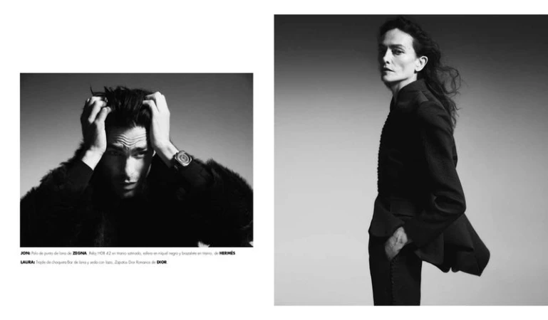 Black and white fashion editorial spread featuring Jon Kortajarena and Laura Ponte in dark designer tailoring against a studio backdrop.