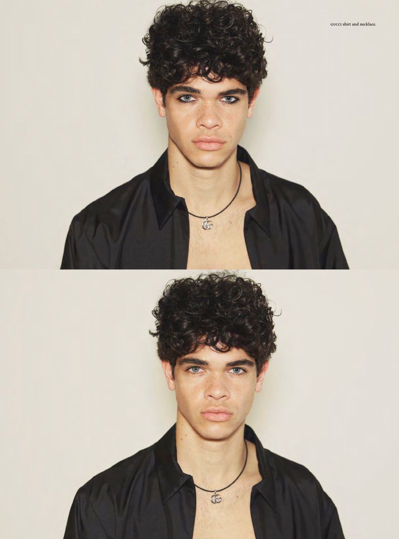 Two stacked portrait shots of a young man with curly dark hair and an open black shirt comparing eyeliner looks on a pale backdrop.