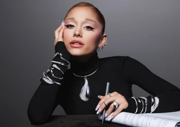 Ariana Grande wearing silver Swarovski jewelry and a black turtleneck for the Classica campaign photographed by Mert and Marcus