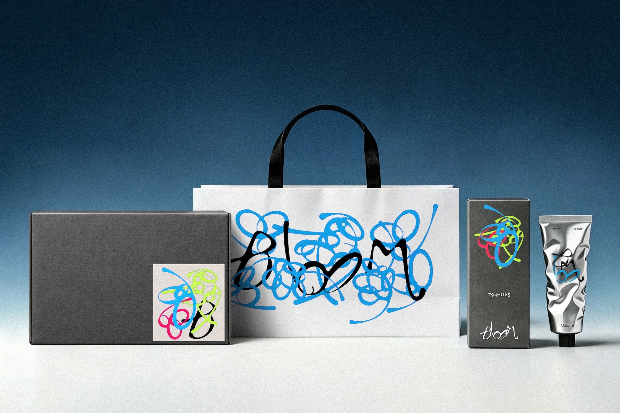 Branded packaging mockup for Bloom featuring a white shopping bag, dark box, carton, and metallic cosmetic tube with blue scribble art.