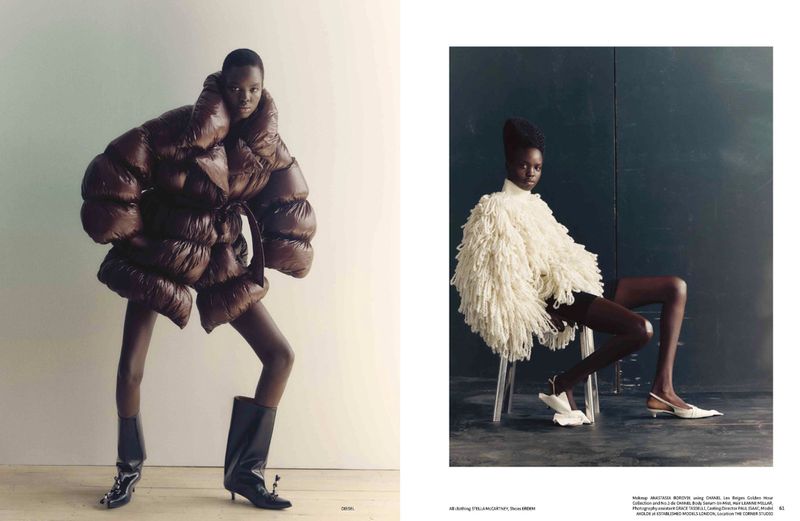 Two women in avant-garde fashion; one wears a brown puffer coat and boots, the other an ivory shag jacket and slingbacks.