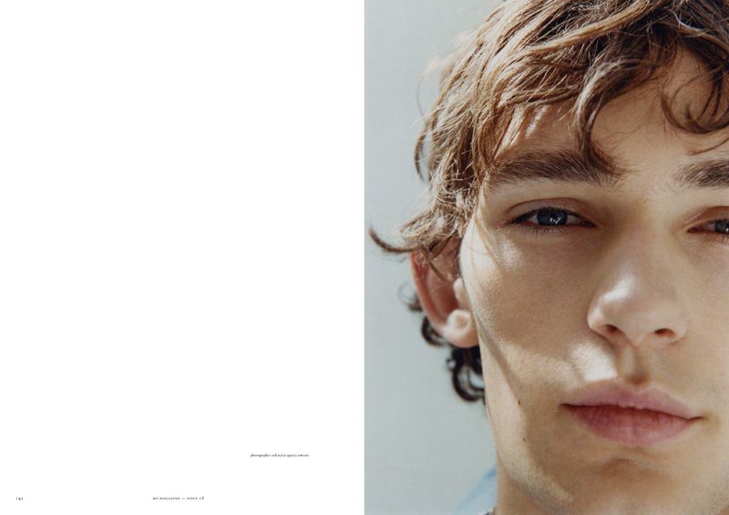 Close-up portrait of model Noah Bates on a magazine spread for Contours of Light in My Magazine.