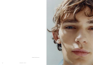 Close-up portrait of model Noah Bates on a magazine spread for Contours of Light in My Magazine.