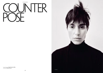 Model Mariane Godoy with short dark hair in a black turtleneck against a white background in a magazine spread.