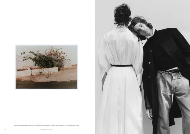 Editorial spread with two models posed together in black and white beside an inset color photo of a flowering planter.