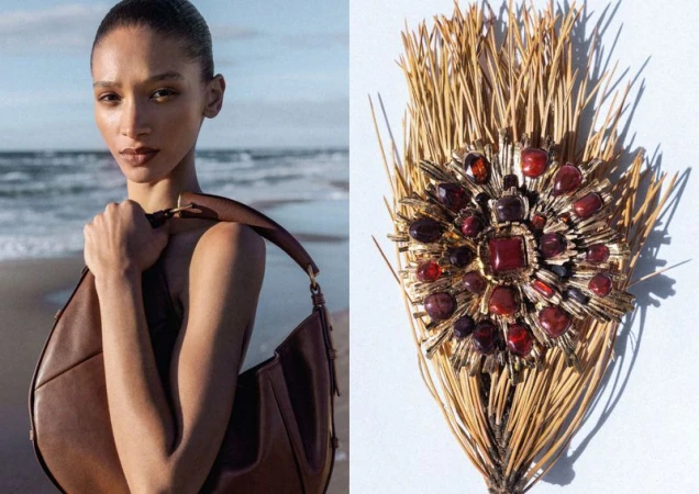 Model Elodie Guipaud holding a brown leather shoulder bag on a beach beside a jeweled brooch on pine needles.