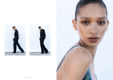 Editorial spread with a beauty close-up of model Elodie Guipaud and inset photos of her wearing an oversized black suit.