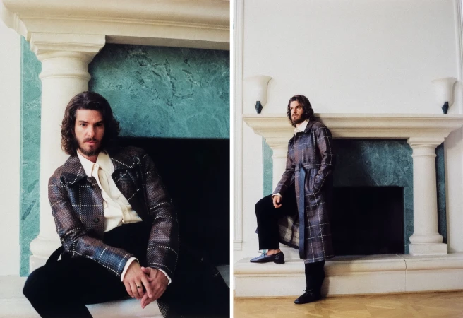 Diptych of actor Andrew Garfield posing in a plaid leather coat beside a classical fireplace with green marble accents.