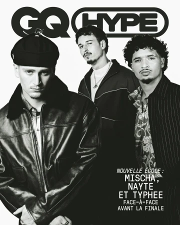 Black and white magazine cover featuring three men styled in streetwear and leather jackets against a white studio background.