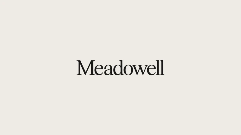 Meadowell typography logo centered on a neutral off-white background