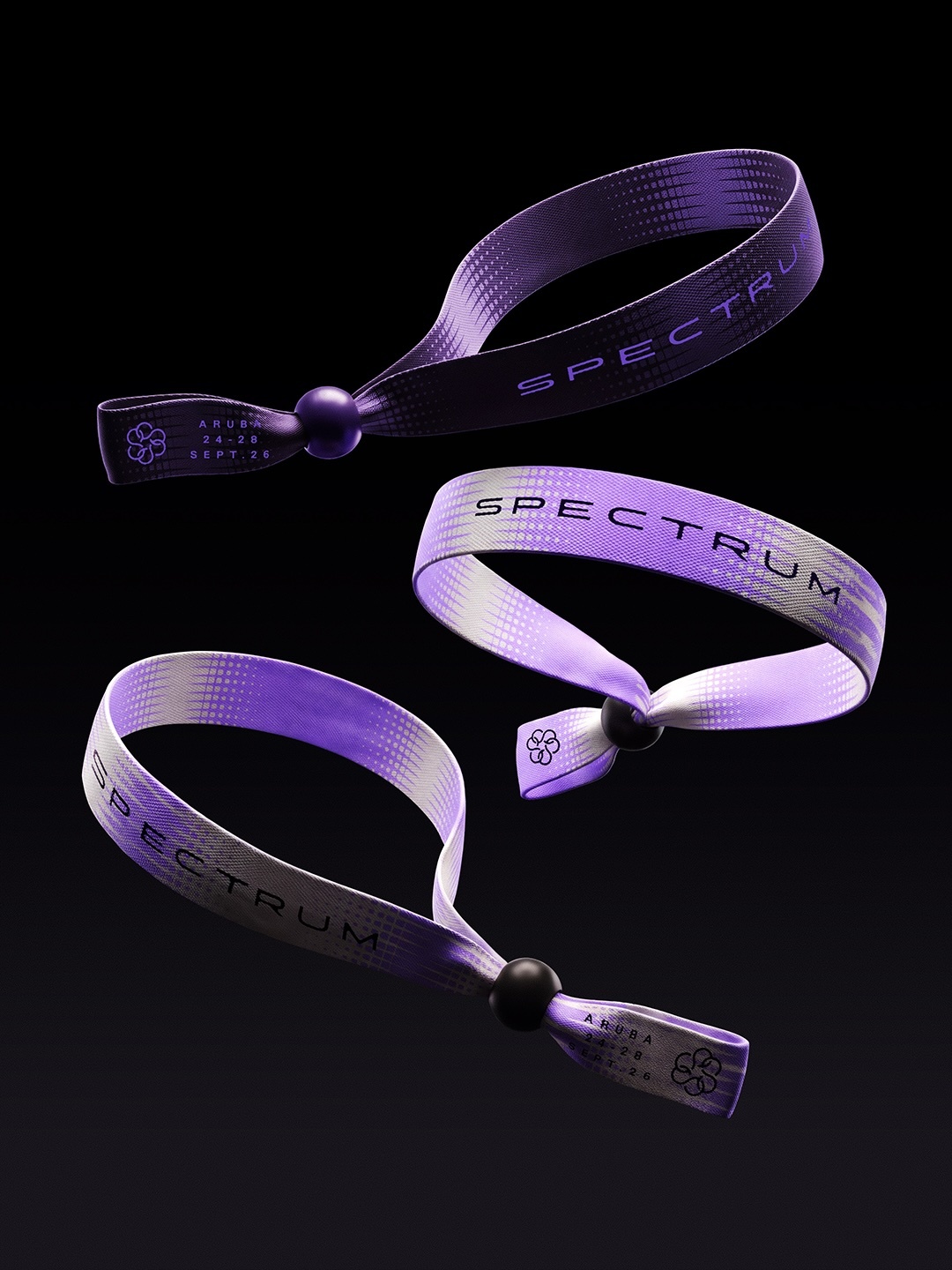 Three purple and white woven event wristbands with black beads and printed Spectrum typography floating against a dark background.