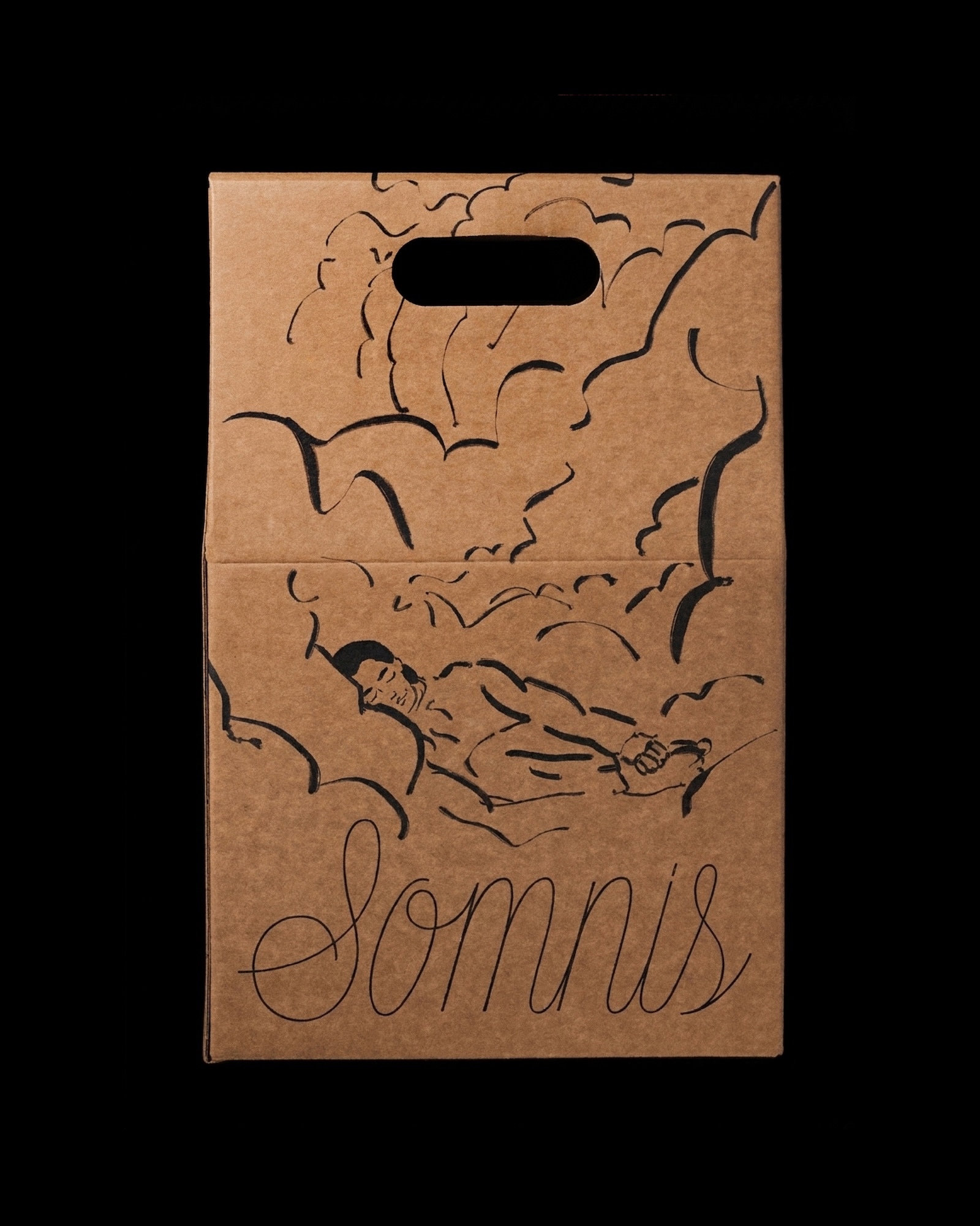 Brown cardboard carrier box featuring black ink illustration of a reclining figure and organic cloud patterns
