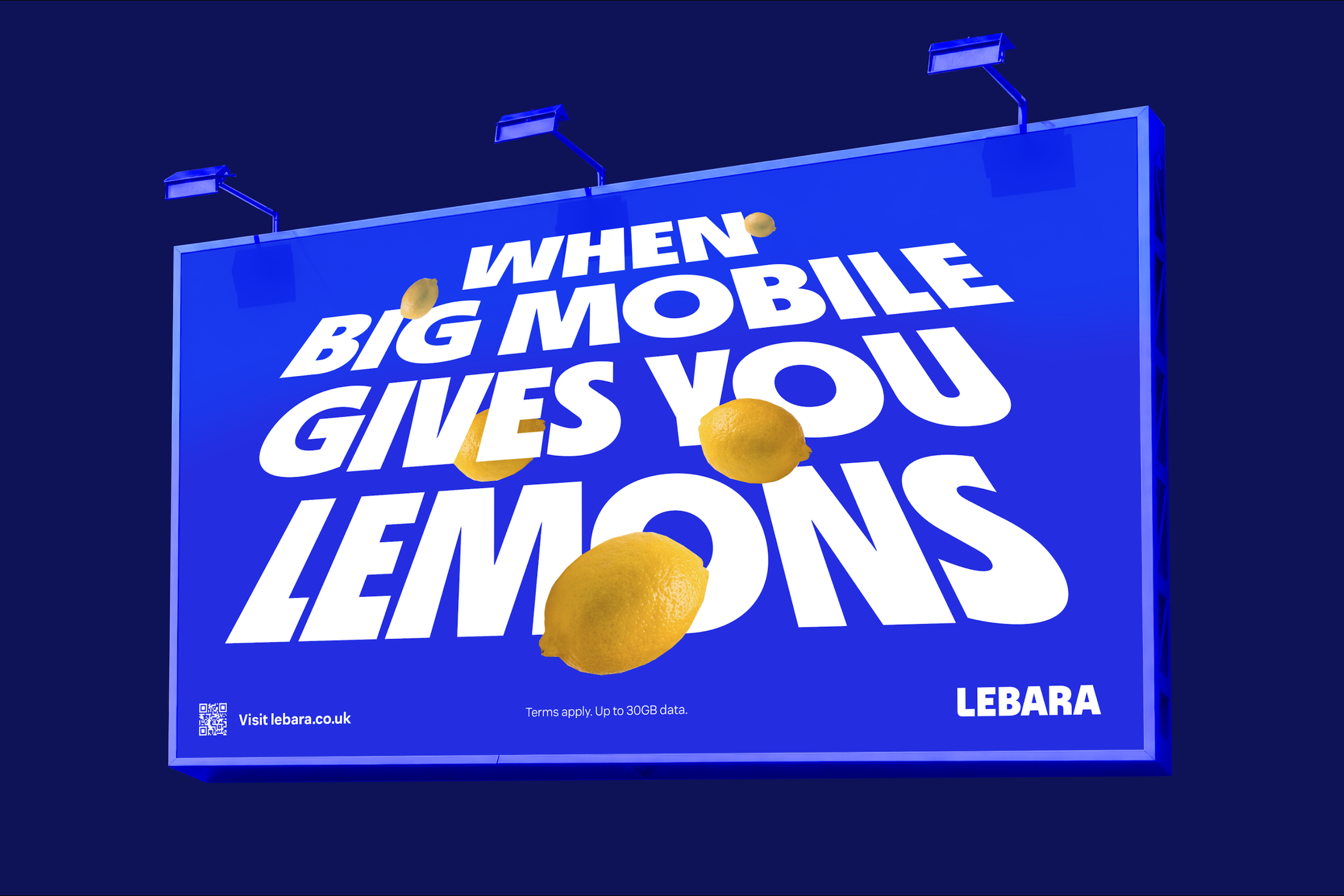 Blue billboard featuring large white text saying When big mobile gives you lemons and several yellow lemons.