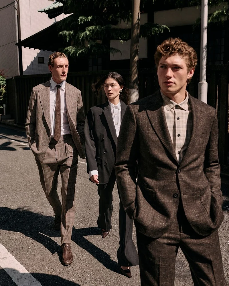 Three models walking down a sunny street in tailored suits for Banana Republic September campaign by Sonia Szostak