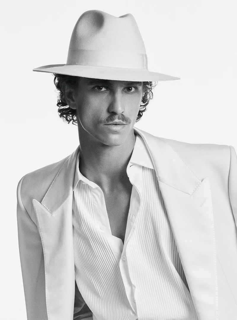 Man wearing a fedora hat and white suit jacket for Borsalino Fall/Winter 2026 campaign