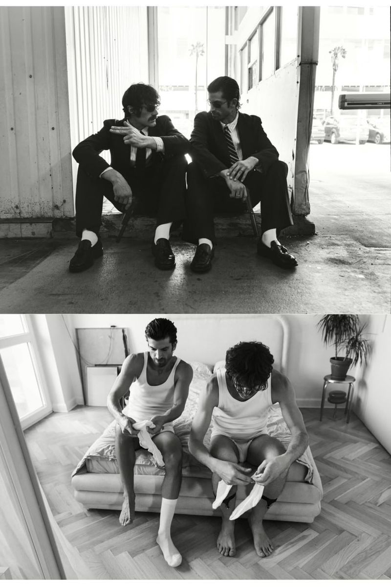 Two split-frame black and white editorial photographs showing men in suits outdoors and in white tank tops indoors on a bed.
